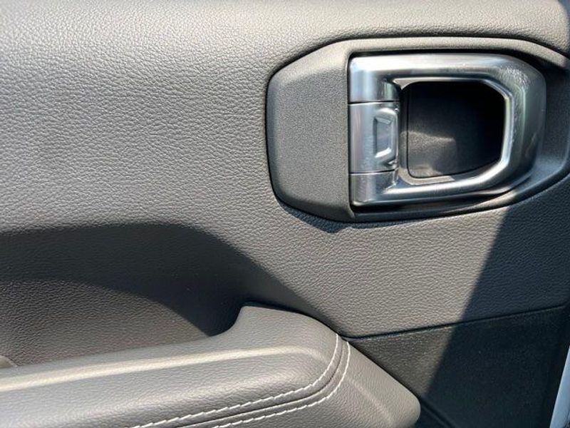 2023 Jeep Wrangler Sahara 4xe in a Silver Zynith Clear Coat exterior color and Blackinterior. Lakeshore CDJR Seaford 302-213-6058 lakeshorecdjr.com 