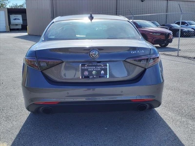 2024 Alfa Romeo Giulia Ti in a Vesuvio Gray Metallic exterior color and Blackinterior. Northside Imports Houston 281-475-4549 northsideimportshouston.com 