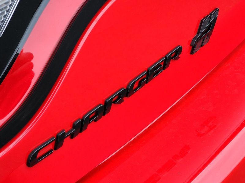2023 Dodge Charger SXT Awd in a TorRed exterior color and Blackinterior. Elder Chrysler Dodge Jeep Ram 9032920419 elderchryslerdodgejeep.com 