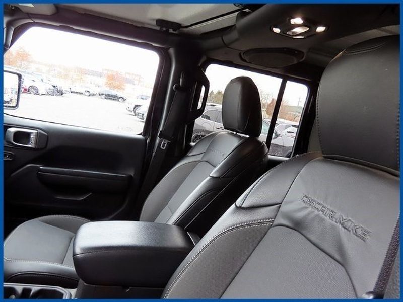 2020 Jeep Wrangler Unlimited Freedom Edition in a Black Clear Coat exterior color and Blackinterior. Papas Jeep Ram In New Britain, CT 860-356-0523 papasjeepram.com 