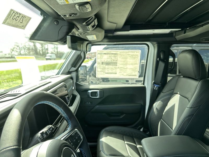 2024 Jeep Wrangler 4-door High Altitude 4xe in a Bright White Clear Coat exterior color and Blackinterior. Gupton Motors Inc 615-384-2886 guptonmotors.com 