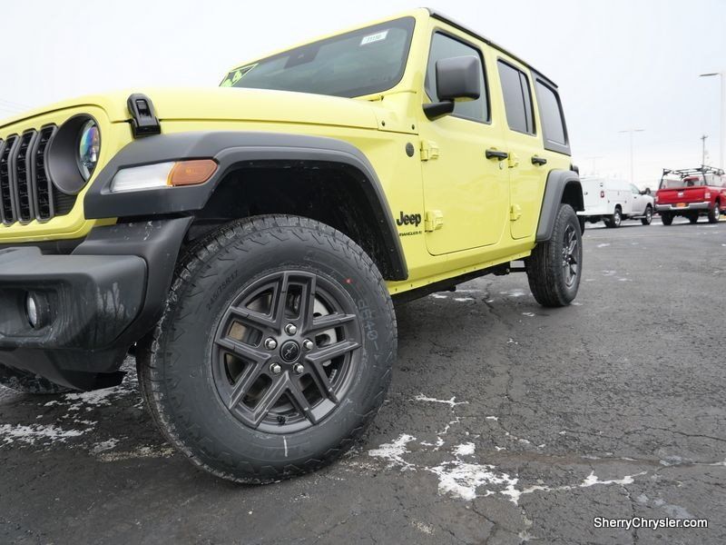 2024 Jeep Wrangler 4-door Sport S in a High Velocity Clear Coat exterior color and Blackinterior. Paul Sherry Chrysler Dodge Jeep RAM (937) 749-7061 sherrychrysler.net 