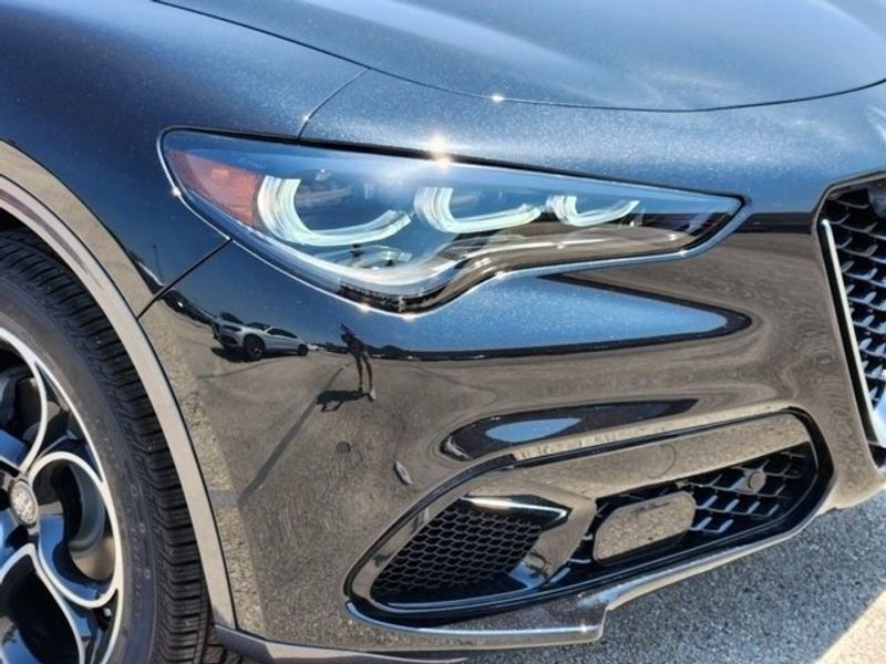 2024 Alfa Romeo Stelvio Ti in a Vulcano Black Metallic exterior color and Blackinterior. Northside Imports Houston 281-475-4549 northsideimportshouston.com 