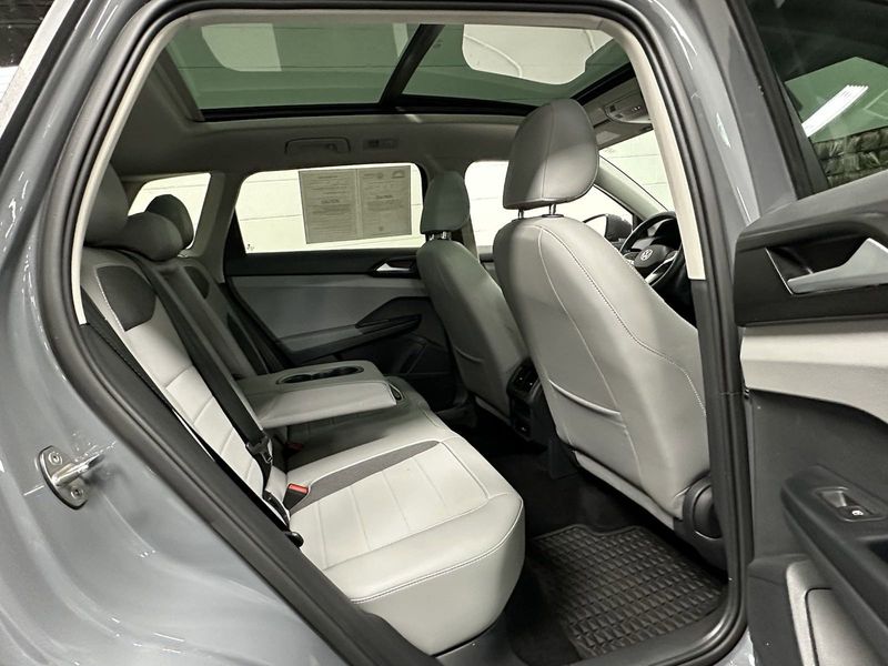 2023 Volkswagen Taos SE w/Sunroof & Black Wheel Pkg in a Pure Gray exterior color and Gray Heated Seatsinterior. Schmelz Countryside Alfa Romeo and Fiat (651) 968-0556 schmelzfiat.com 