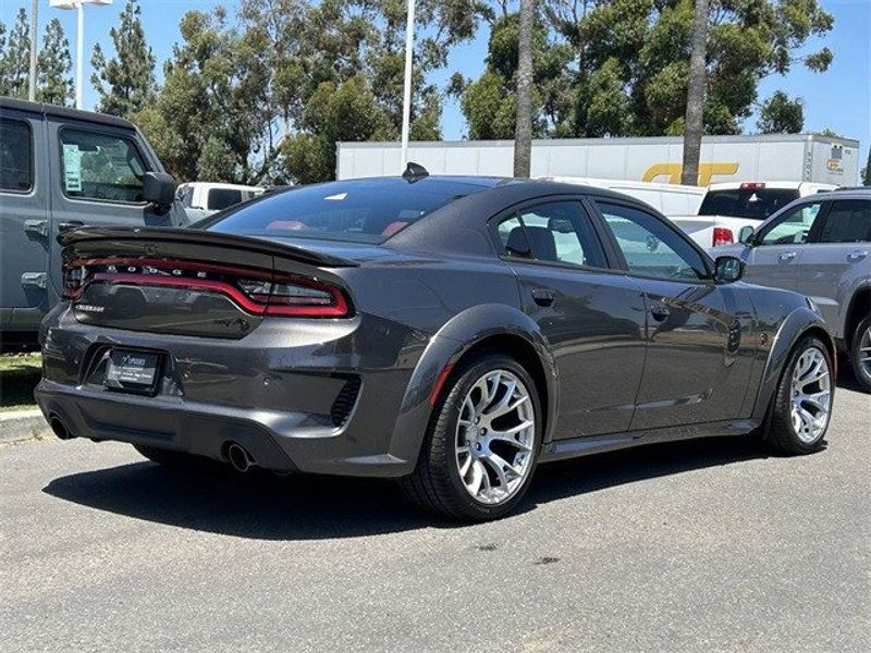 2023 Dodge Charger Srt Hellcat Widebody Jailbreak in a Granite exterior color and Demonic Red/Blackinterior. McPeek