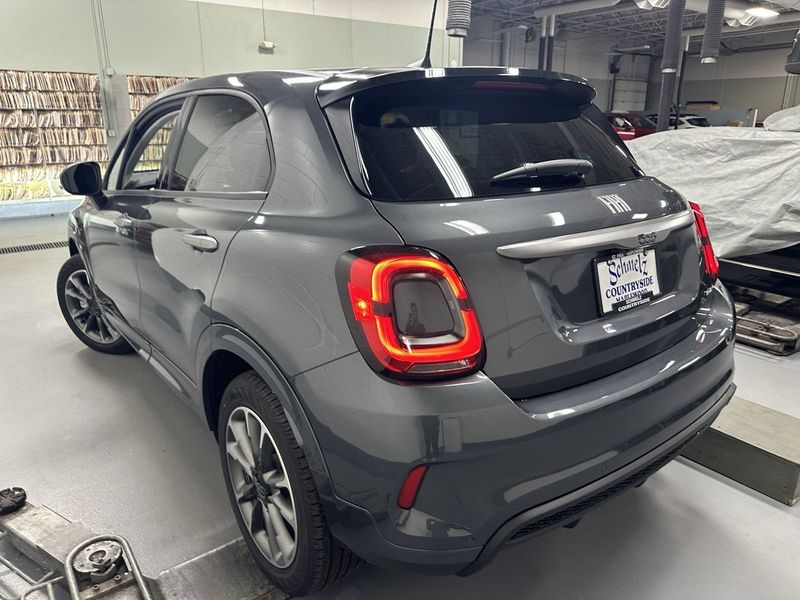 2023 Fiat 500x Sport Awd in a Grigio Moda (Graphite Gray Metallic) exterior color. Schmelz Countryside Alfa Romeo and Fiat (651) 968-0556 schmelzfiat.com 