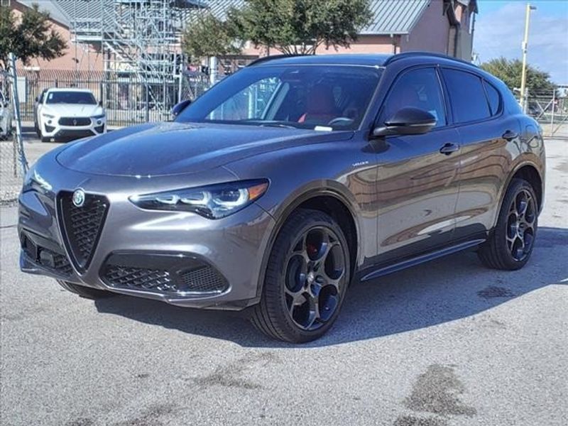 2024 Alfa Romeo Stelvio Veloce in a Vesuvio Gray Metallic exterior color and Blackinterior. Northside Imports Houston 281-475-4549 northsideimportshouston.com 