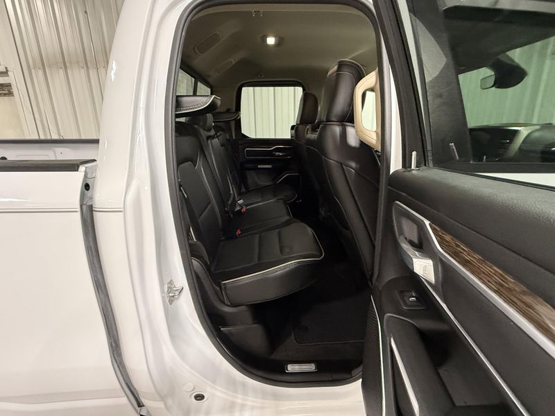 Used 2020 RAM 1500 Laramie in a Bright White Clear Coat exterior color and Blackinterior. Thys Motor Company 319-318-6640 thysmotorco.com 