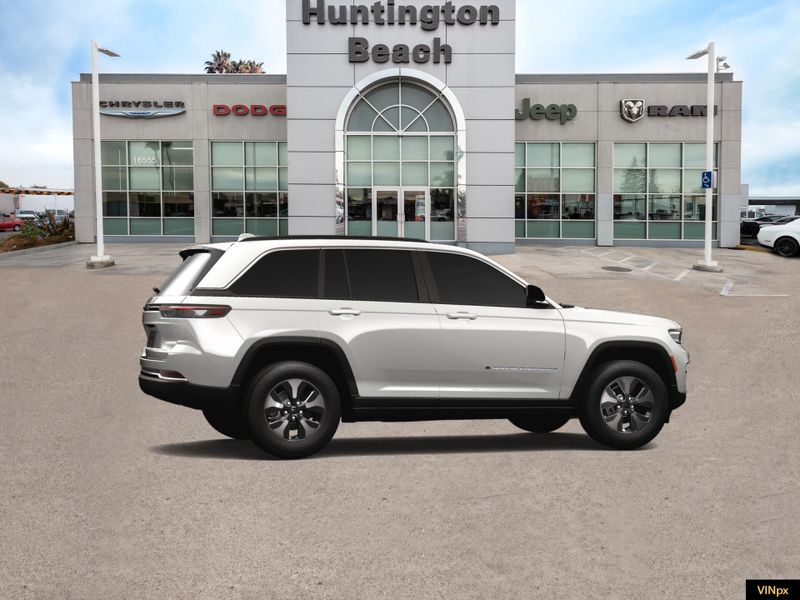 2023 Jeep Grand Cherokee 4xe Base 4x4 in a Bright White exterior color and Global Blackinterior. BEACH BLVD OF CARS beachblvdofcars.com 