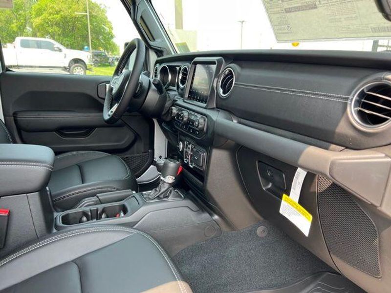 2023 Jeep Wrangler Sahara 4xe in a Silver Zynith Clear Coat exterior color and Blackinterior. Lakeshore CDJR Seaford 302-213-6058 lakeshorecdjr.com 