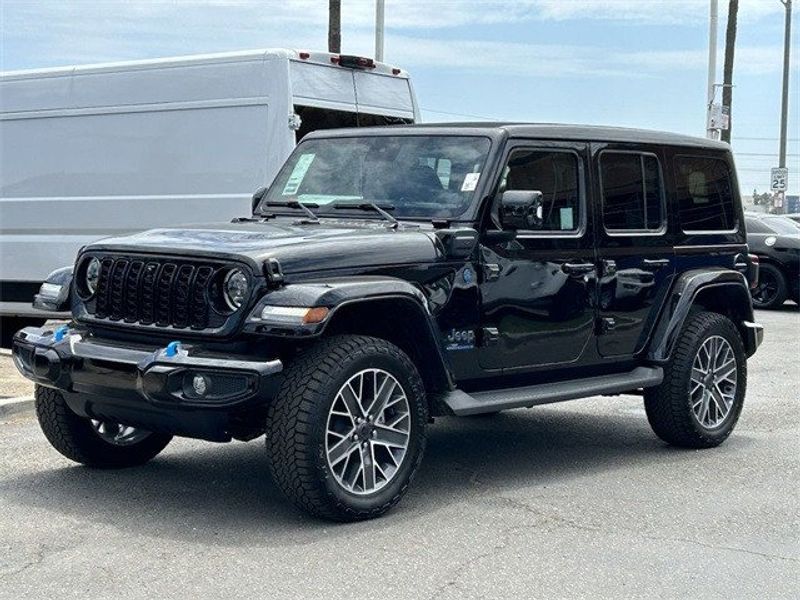 2024 Jeep Wrangler 4-door High Altitude 4xe in a Black Clear Coat exterior color and Blackinterior. McPeek