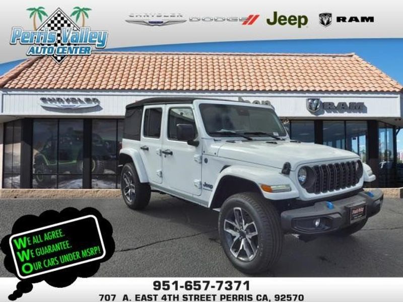 2024 Jeep Wrangler Sport S 4xe in a Bright White Clear Coat exterior color and Blackinterior. Perris Valley Auto Center 951-657-6100 perrisvalleyautocenter.com 