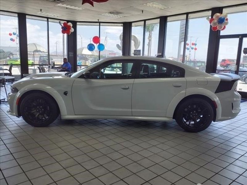 2023 Dodge Charger Srt Hellcat Widebody Jailbreak in a White Knuckle exterior color and Blackinterior. Perris Valley Chrysler Dodge Jeep Ram 951-355-1970 perrisvalleydodgejeepchrysler.com 