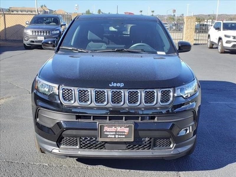 2024 Jeep Compass Sport in a Diamond Black Crystal Pearl Coat exterior color and Blackinterior. Perris Valley Auto Center 951-657-6100 perrisvalleyautocenter.com 