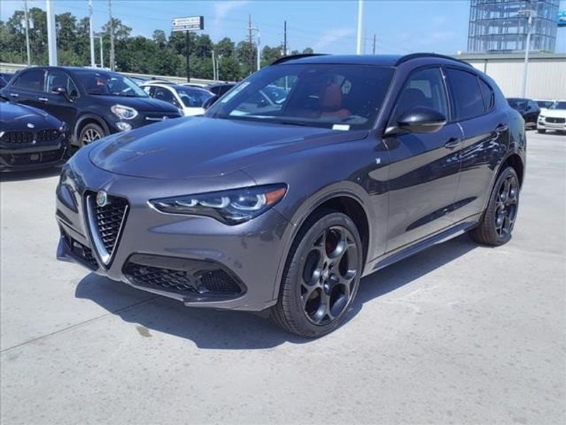 2024 Alfa Romeo Stelvio Ti in a Vesuvio Gray Metallic exterior color and Blackinterior. Northside Imports Houston 281-475-4549 northsideimportshouston.com 