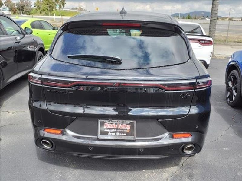 2024 Dodge Hornet R/T in a 8 Ball exterior color and Blackinterior. Perris Valley Auto Center 951-657-6100 perrisvalleyautocenter.com 