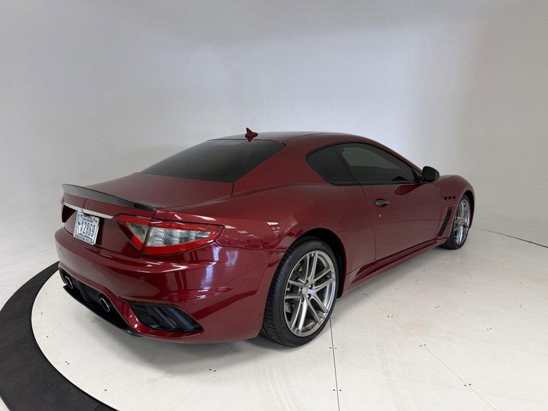 2018 Maserati GranTurismo MC in a Rosso Trionfale Metallic exterior color and Bianco Pregiatointerior. Karma Newport Beach (844) 527-6262 karmanb.com 