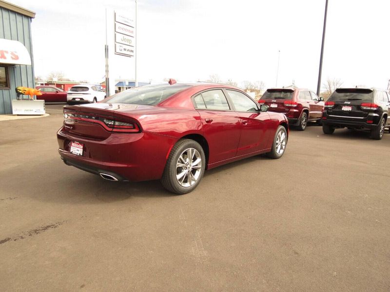 2023 Dodge Charger SXT Awd in a Octane Red exterior color and Blackinterior. Militello Motors ​507-200-4344 militellomotors.net 