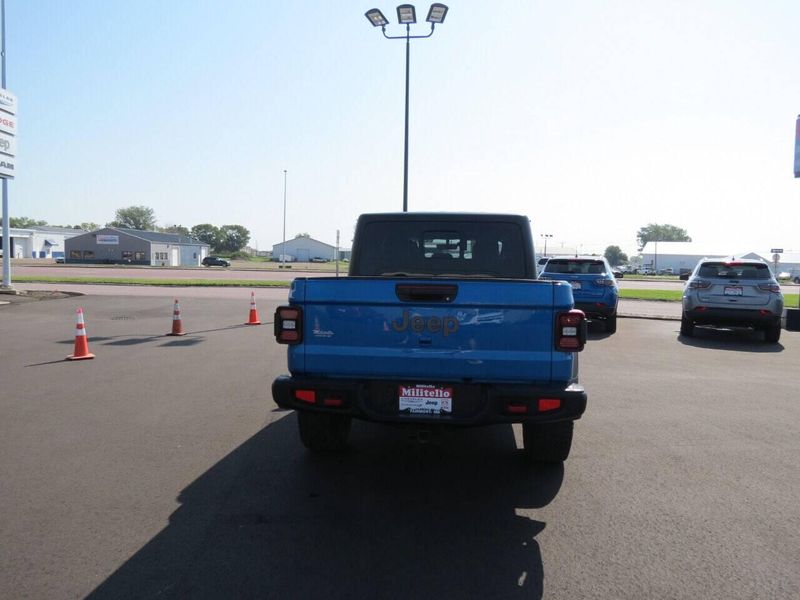 2021 Jeep Gladiator Rubicon 4x4 4dr Crew Cab 5.0 ft. SB in a Blue exterior color and Blackinterior. Militello Motors ​507-200-4344 militellomotors.net 