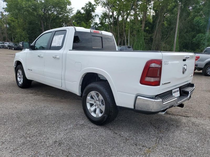 2020 RAM 1500 Laramie in a Bright White Clear Coat exterior color and Blackinterior. Johnson Dodge 601-693-6343 pixelmotiondemo.com 