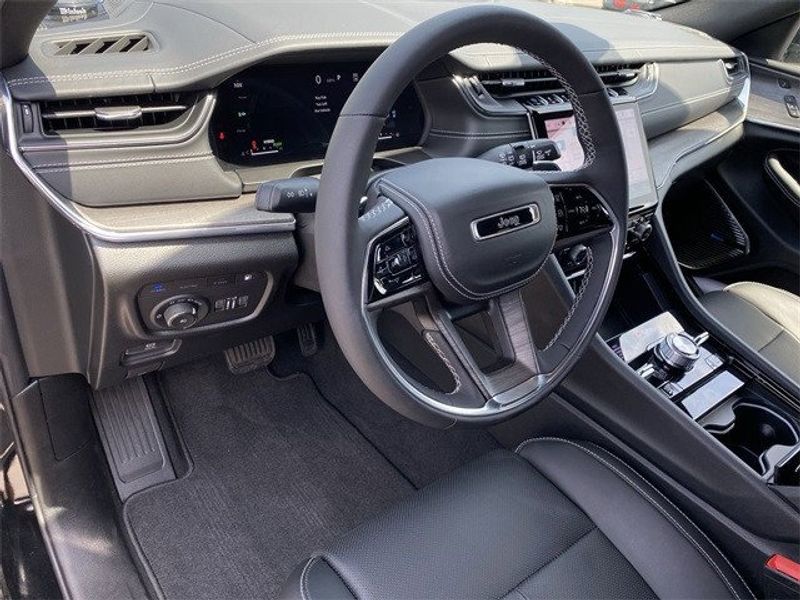 2023 Jeep Grand Cherokee Overland 4xe in a Diamond Black Crystal Pearl Coat exterior color and Global Blackinterior. McPeek