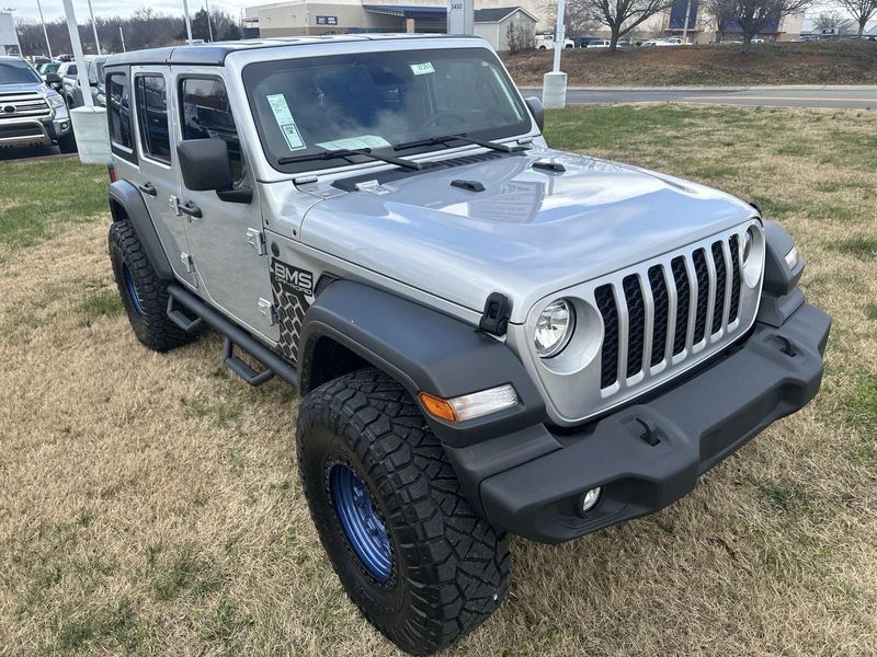 2024 Jeep Wrangler 4-door Sport S in a Silver Zynith Clear Coat exterior color and Blackinterior. Gupton Motors Inc 615-384-2886 guptonmotors.com 