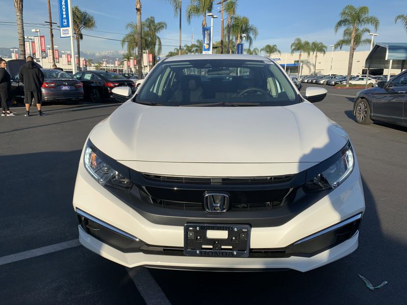 2020 Honda Civic Sedan LX in a White exterior color. BEACH BLVD OF CARS beachblvdofcars.com 