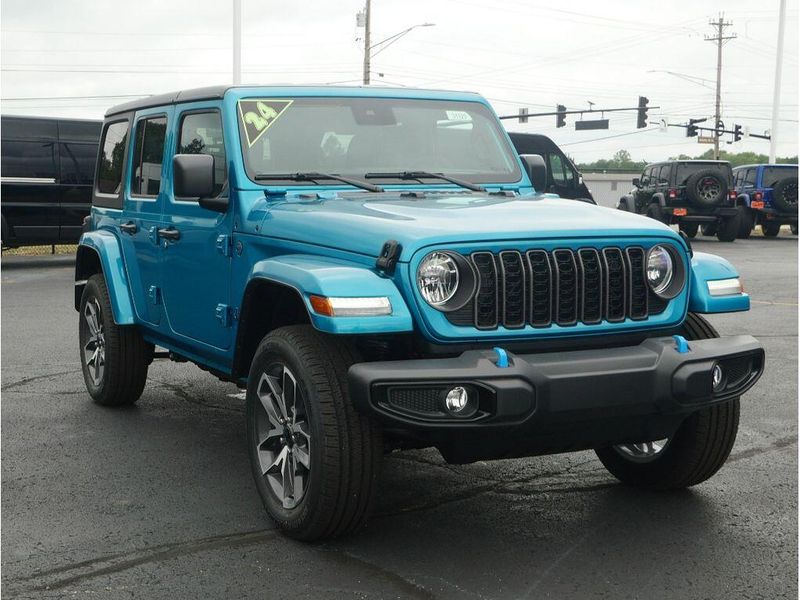 2024 Jeep Wrangler 4-door Sport S 4xe in a Bikini Pearl Coat exterior color and Blackinterior. Paul Sherry Chrysler Dodge Jeep RAM (937) 749-7061 sherrychrysler.net 