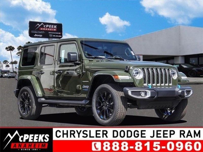 2022 Jeep Wrangler Sahara 4xe in a Sarge Green Clear Coat exterior color and Blackinterior. McPeek