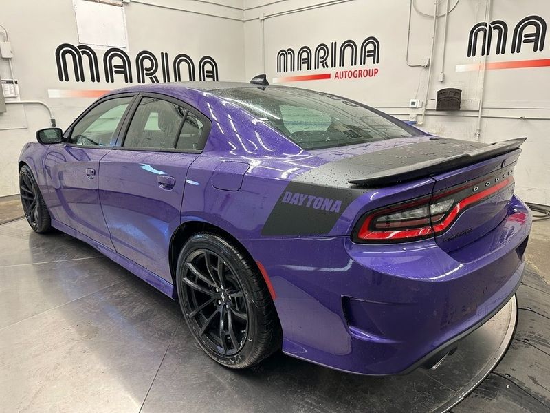 2023 Dodge Charger Scat Pack in a Plum Crazy exterior color. Marina Auto Group (855) 564-8688 marinaautogroup.com 