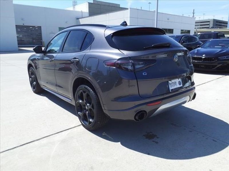 2024 Alfa Romeo Stelvio Ti in a Vesuvio Gray Metallic exterior color and Blackinterior. Northside Imports Houston 281-475-4549 northsideimportshouston.com 