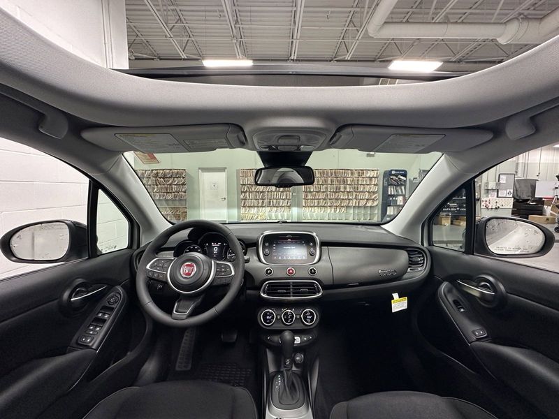 2023 Fiat 500x Pop Awd in a Bianco Gelato (White Clear Coat) exterior color and Blackinterior. Schmelz Countryside Alfa Romeo and Fiat (651) 968-0556 schmelzfiat.com 