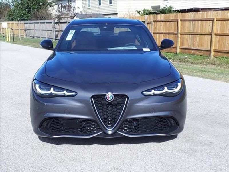 2024 Alfa Romeo Giulia Ti in a Vesuvio Gray Metallic exterior color and Blackinterior. Northside Imports Houston 281-475-4549 northsideimportshouston.com 