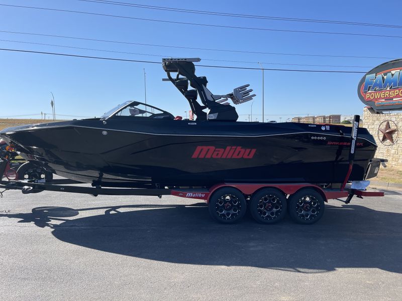 2024 MALIBU Wakesetter 26 LSV  in a BLACK/RED exterior color. Family PowerSports (877) 886-1997 familypowersports.com 