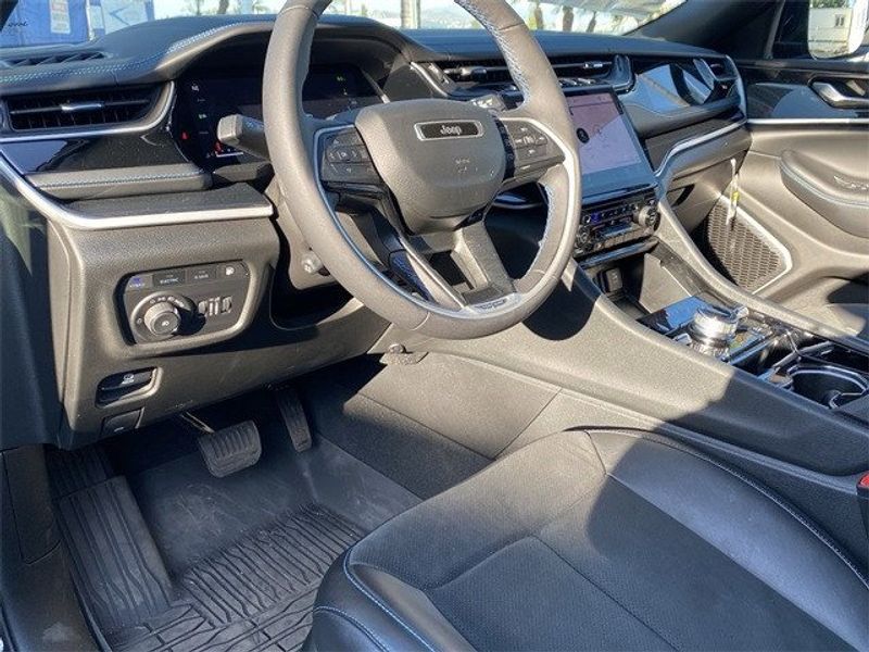2022 Jeep Grand Cherokee Trailhawk 4xe in a Diamond Black Crystal Pearl Coat exterior color and Global Blackinterior. McPeek