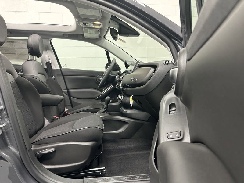 2023 Fiat 500x Pop Awd in a Grigio Moda (Graphite Gray Metallic) exterior color and Black Heated Seatsinterior. Schmelz Countryside Alfa Romeo and Fiat (651) 968-0556 schmelzfiat.com 