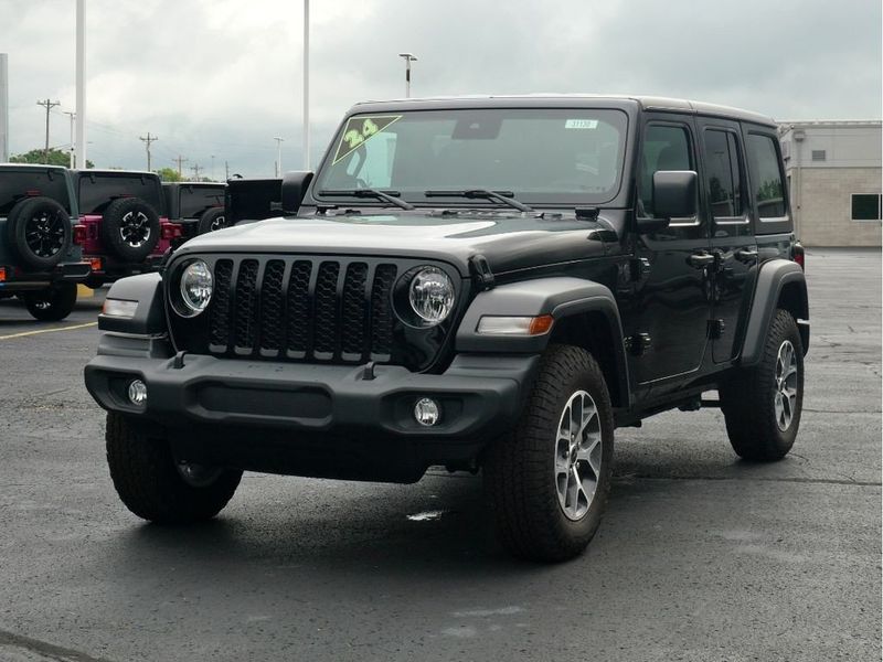 2024 Jeep Wrangler 4-door Sport S in a Black Clear Coat exterior color and Blackinterior. Paul Sherry Chrysler Dodge Jeep RAM (937) 749-7061 sherrychrysler.net 