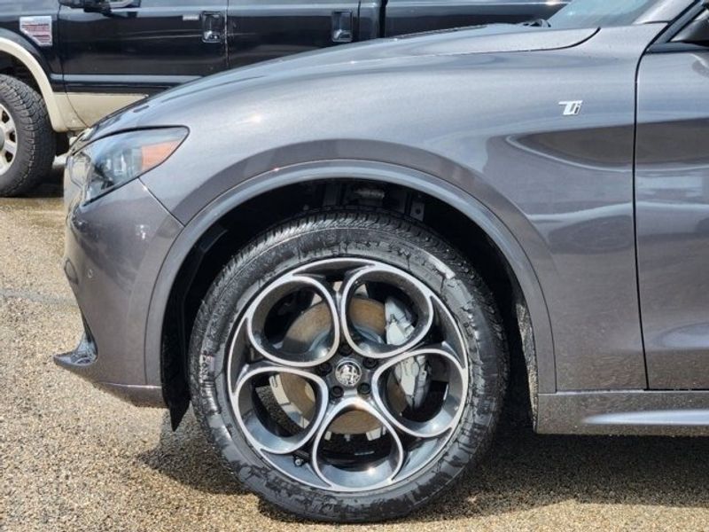 2024 Alfa Romeo Stelvio Ti Awd in a Vesuvio Gray Metallic exterior color and Blackinterior. Northside Alfa Romeo of Houston 281-475-4549 alfaromeousaofnorthhouston.com 