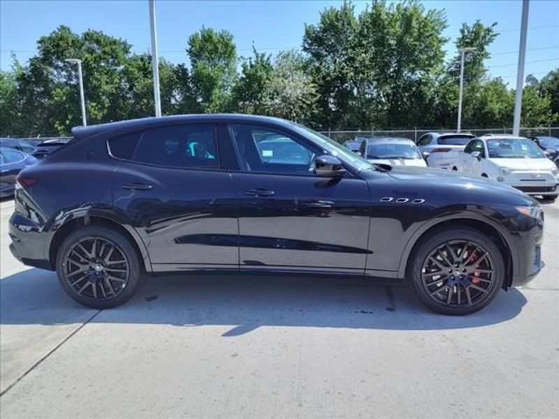 2024 Maserati Levante Modena in a Black exterior color and Black/Redinterior. Northside Imports Houston 281-475-4549 northsideimportshouston.com 