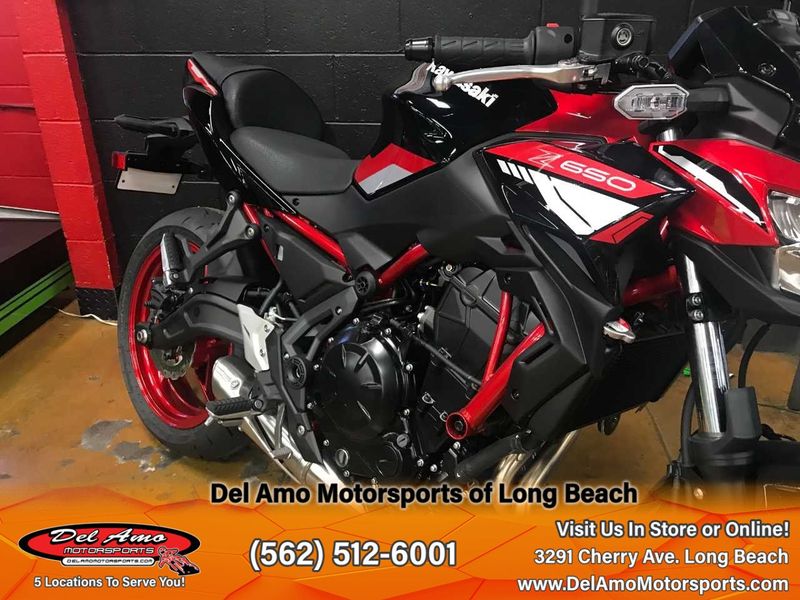 2024 Kawasaki ER650NRFAL-RD1  in a CANDY PERSIMMON RED/EBONY exterior color. Del Amo Motorsports of Long Beach (562) 362-3160 delamomotorsports.com 