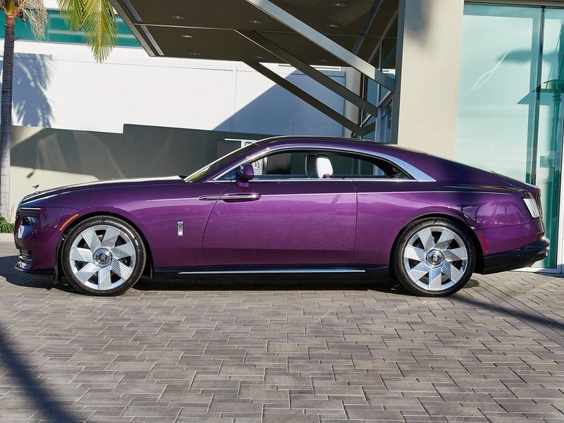 2024 Rolls-Royce Spectre  in a Twilight Purple exterior color and Arctic Whiteinterior. SHELLY AUTOMOTIVE shellyautomotive.com 