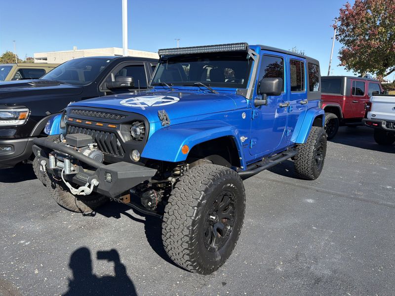 Used 2014 Jeep Wrangler Unlimited Freedom EditionImage 1