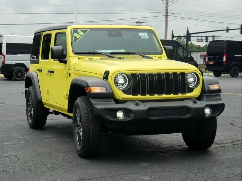 2024 Jeep Wrangler 4-door Sport S in a High Velocity Clear Coat exterior color and Blackinterior. Paul Sherry Chrysler Dodge Jeep RAM (937) 749-7061 sherrychrysler.net 