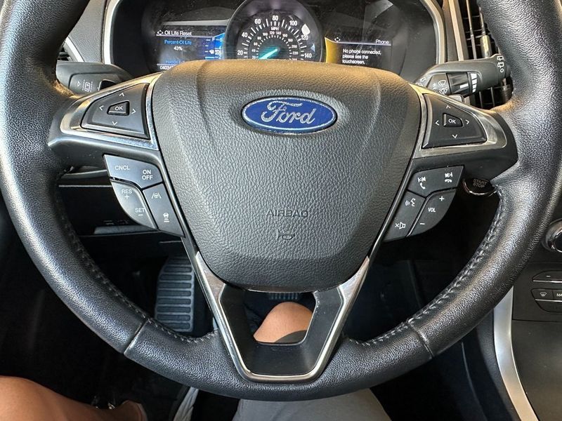 2020 Ford Edge SEL in a Agate Black exterior color and Ebonyinterior. Marina Auto Group (855) 564-8688 marinaautogroup.com 