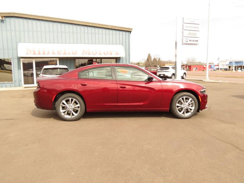 2023 Dodge Charger SXT Awd in a Octane Red exterior color and Blackinterior. Militello Motors ​507-200-4344 militellomotors.net 