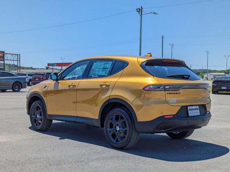 2023 Dodge Hornet Gt Awd in a Acapulco Gold exterior color and Blackinterior. Johnson Dodge 601-693-6343 pixelmotiondemo.com 