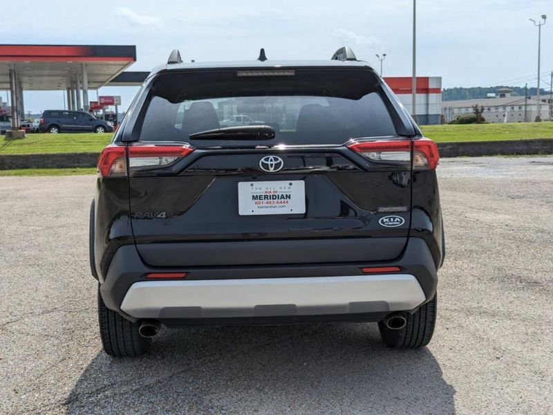 2021 Toyota RAV4 Adventure in a Midnight Black Metallic exterior color. Johnson Dodge 601-693-6343 pixelmotiondemo.com 