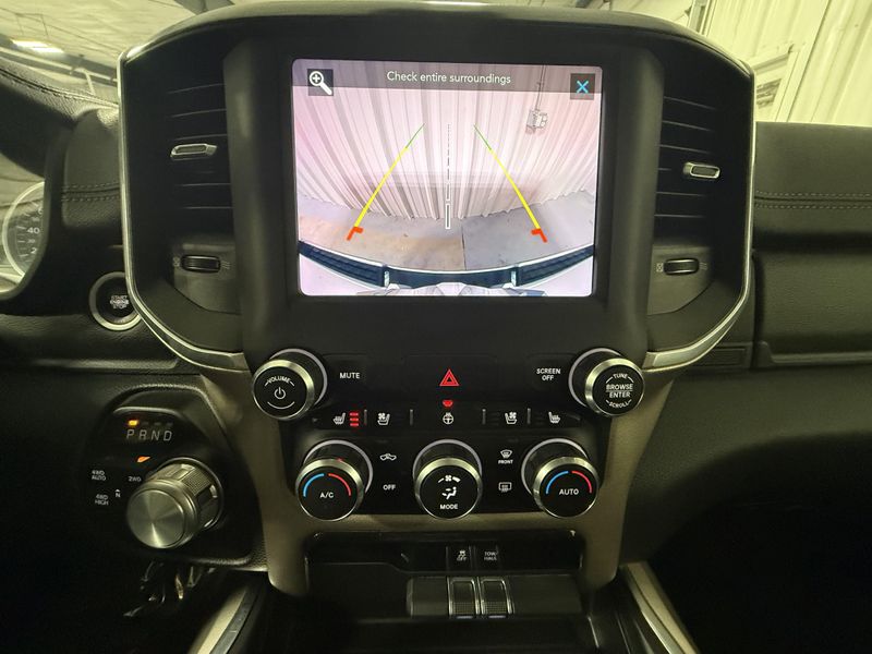 Used 2020 RAM 1500 Laramie in a Bright White Clear Coat exterior color and Blackinterior. Thys Motor Company 319-318-6640 thysmotorco.com 