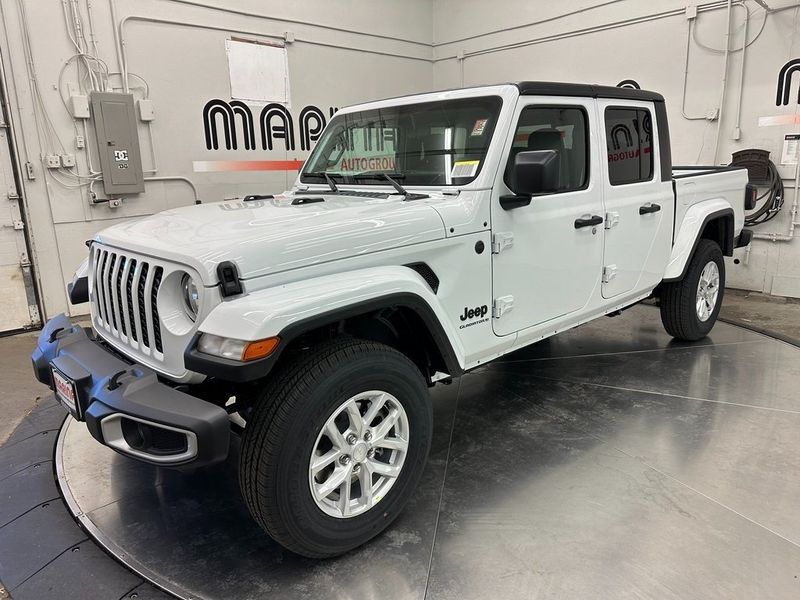 2023 Jeep Gladiator Sport S 4x4 in a Bright White Clear Coat exterior color and Blackinterior. Marina Auto Group (855) 564-8688 marinaautogroup.com 