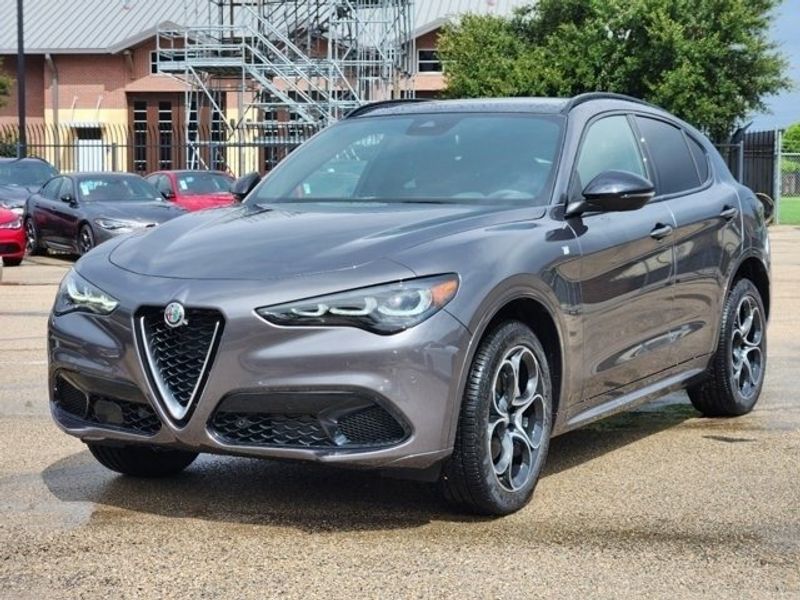 2024 Alfa Romeo Stelvio Ti in a Vesuvio Gray Metallic exterior color and Blackinterior. Northside Imports Houston 281-475-4549 northsideimportshouston.com 